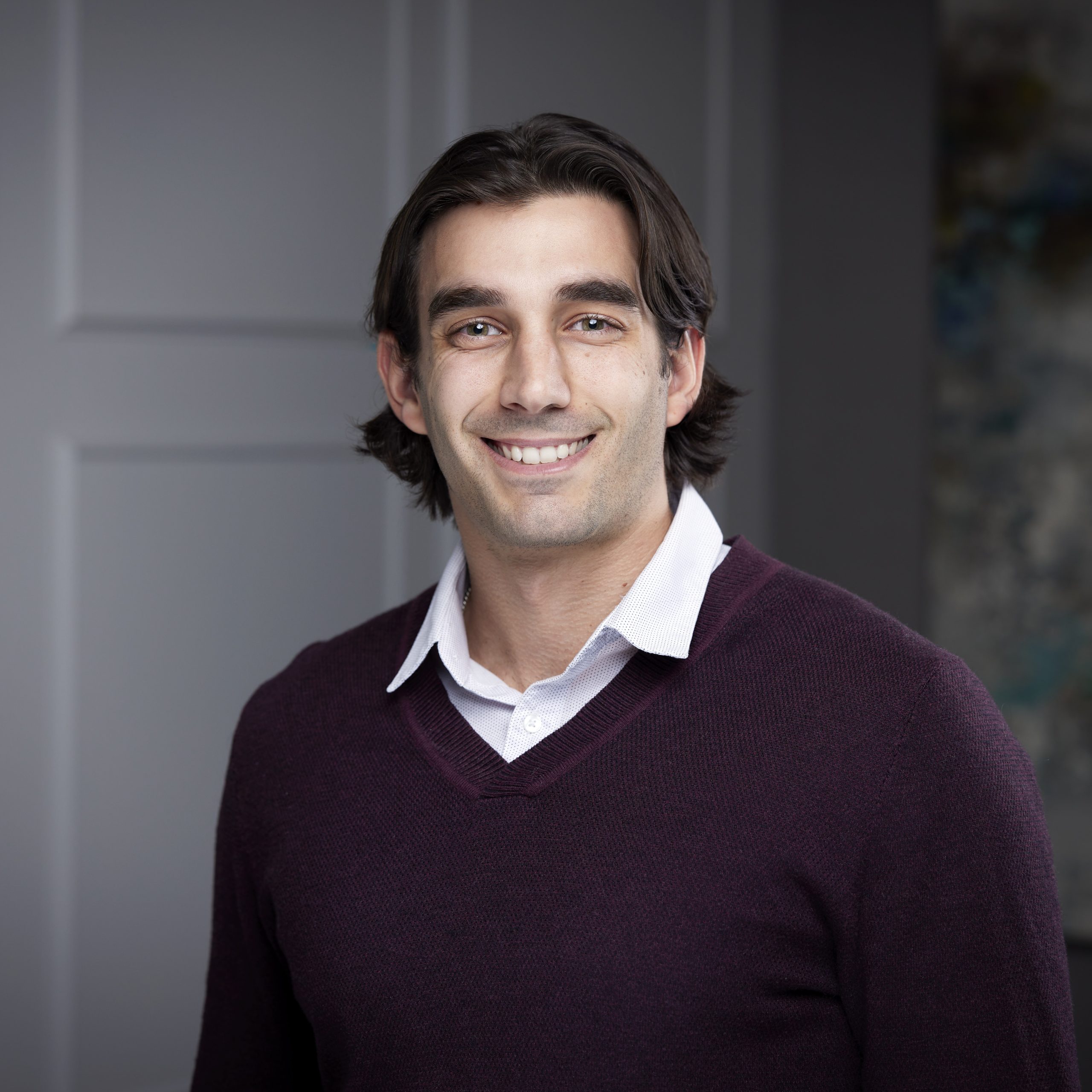 An image of Devon Bufalino in the Niagara Region office of DDL & Co.
