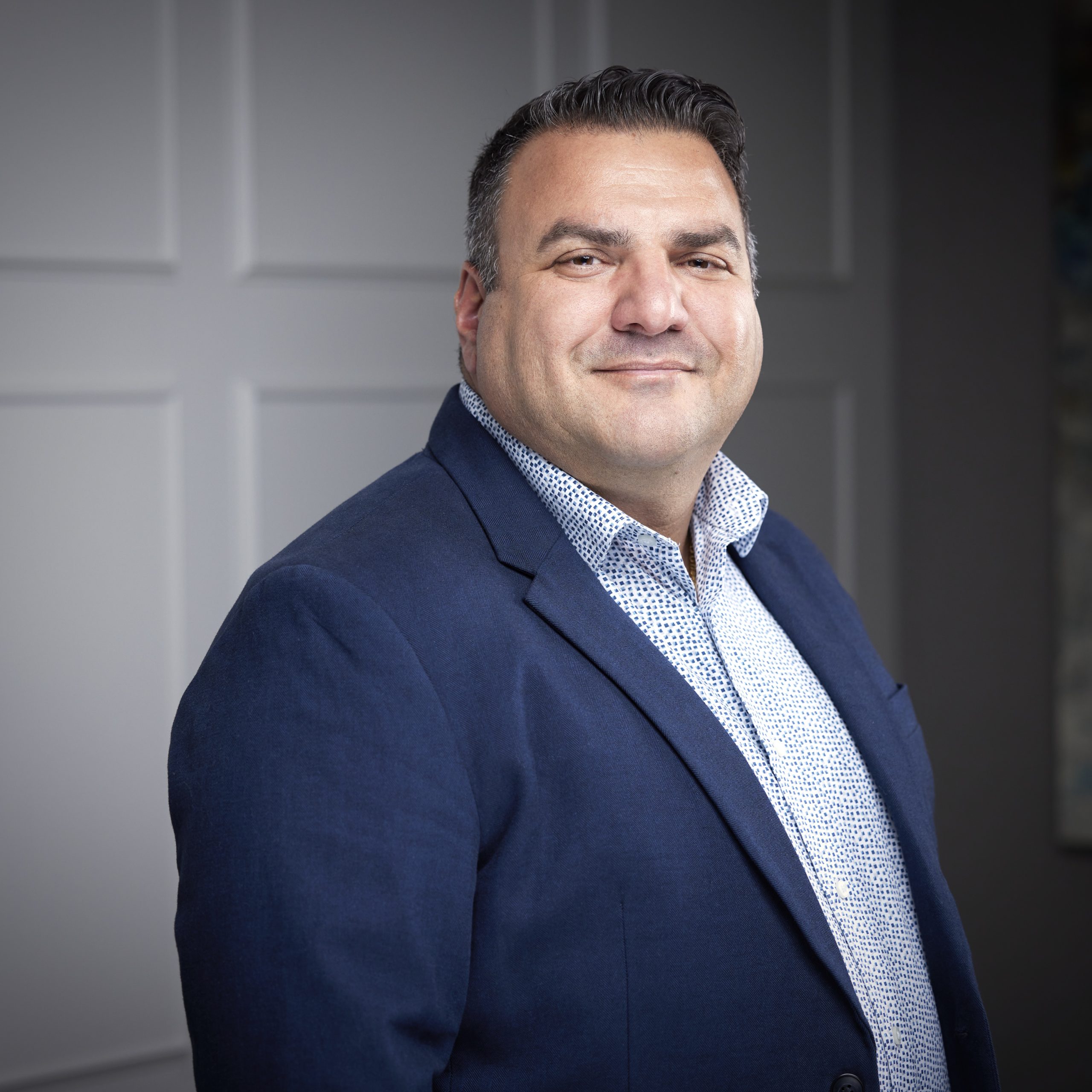 An image of Felice Di Pietro in the Niagara Region office of DDL & Co.