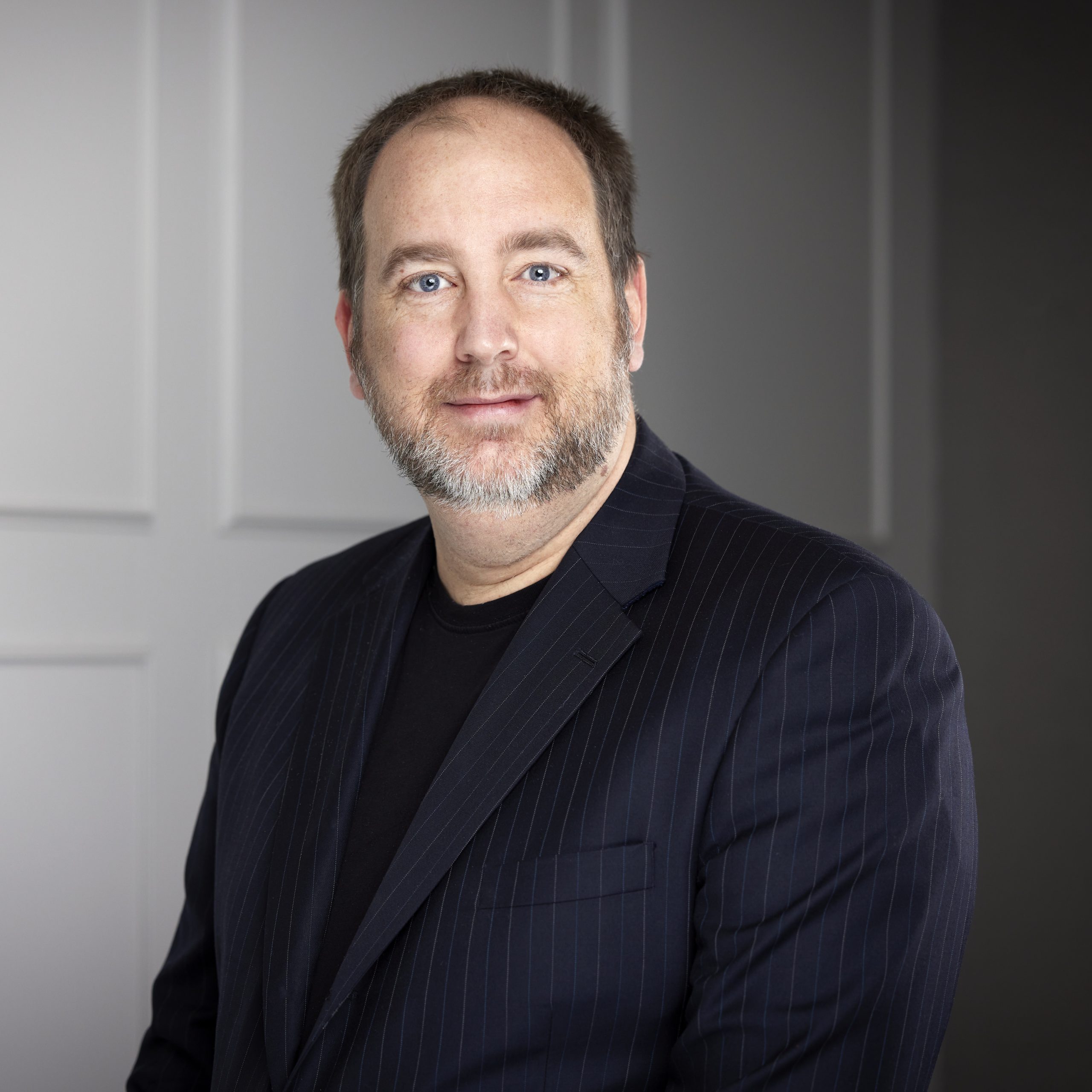 An image of James Little in the Niagara Region office of DDL & Co.
