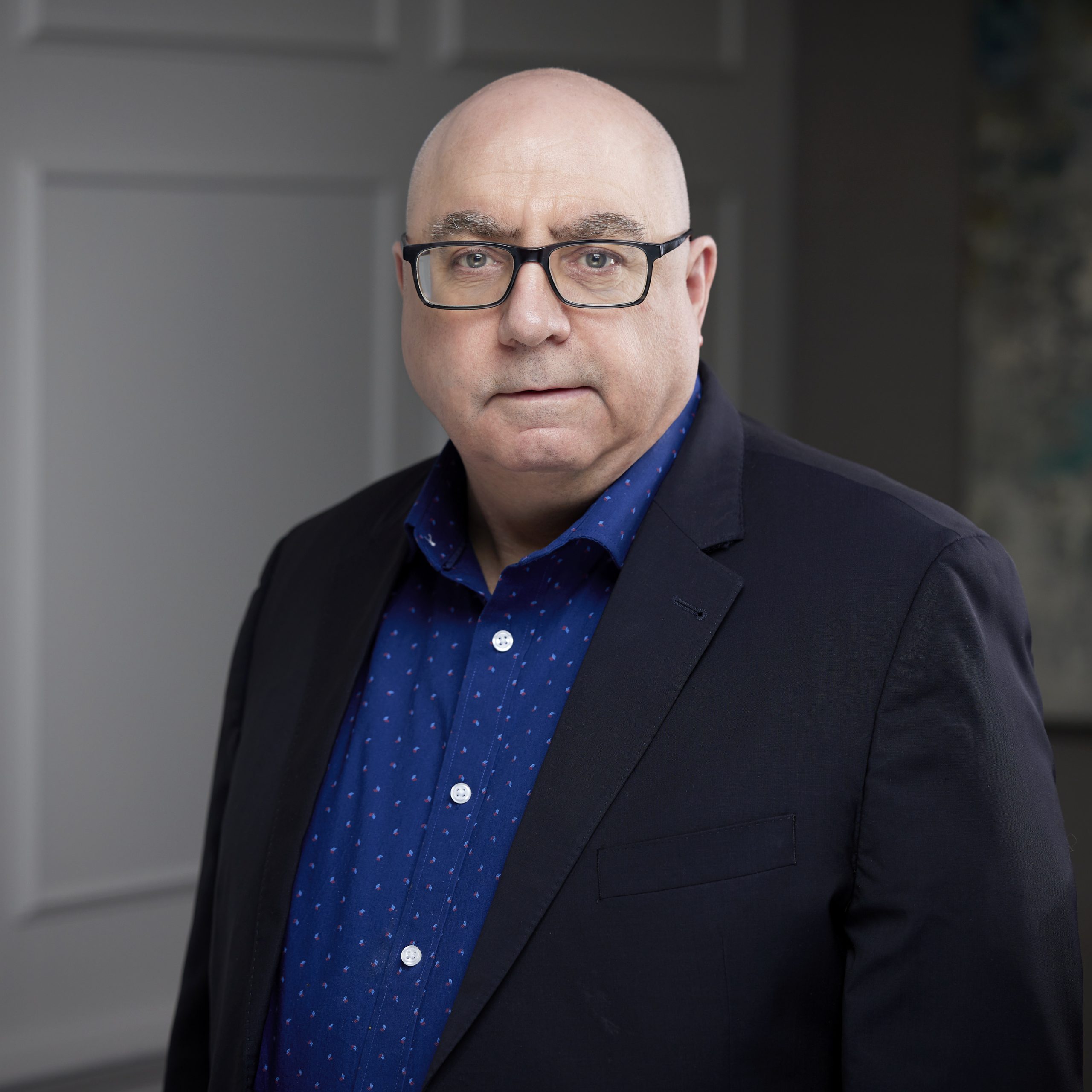 An image of Kevin Voll in the Niagara Region office of DDL & Co.