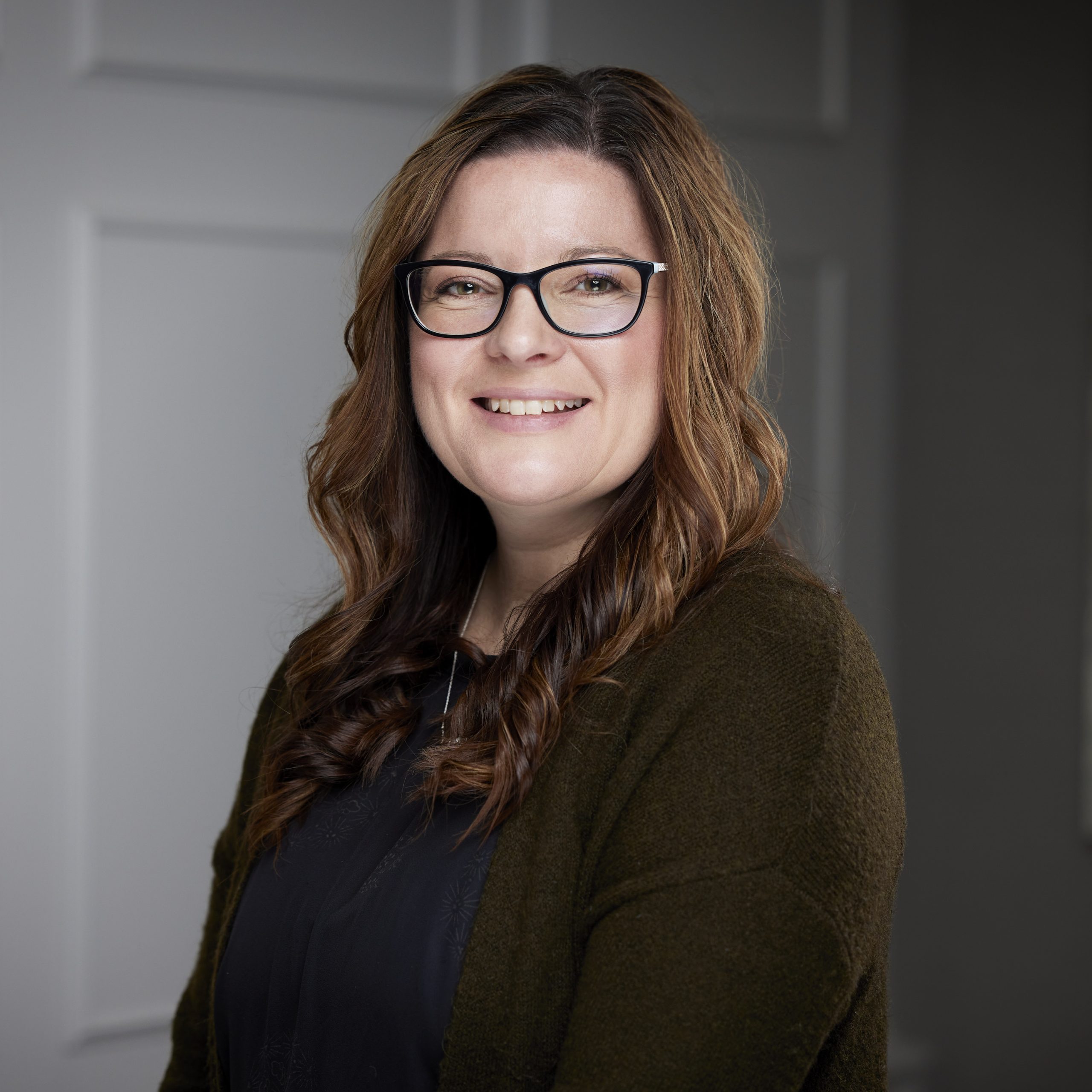 An image of Melissa Cherney in the Niagara Region office of DDL & Co.