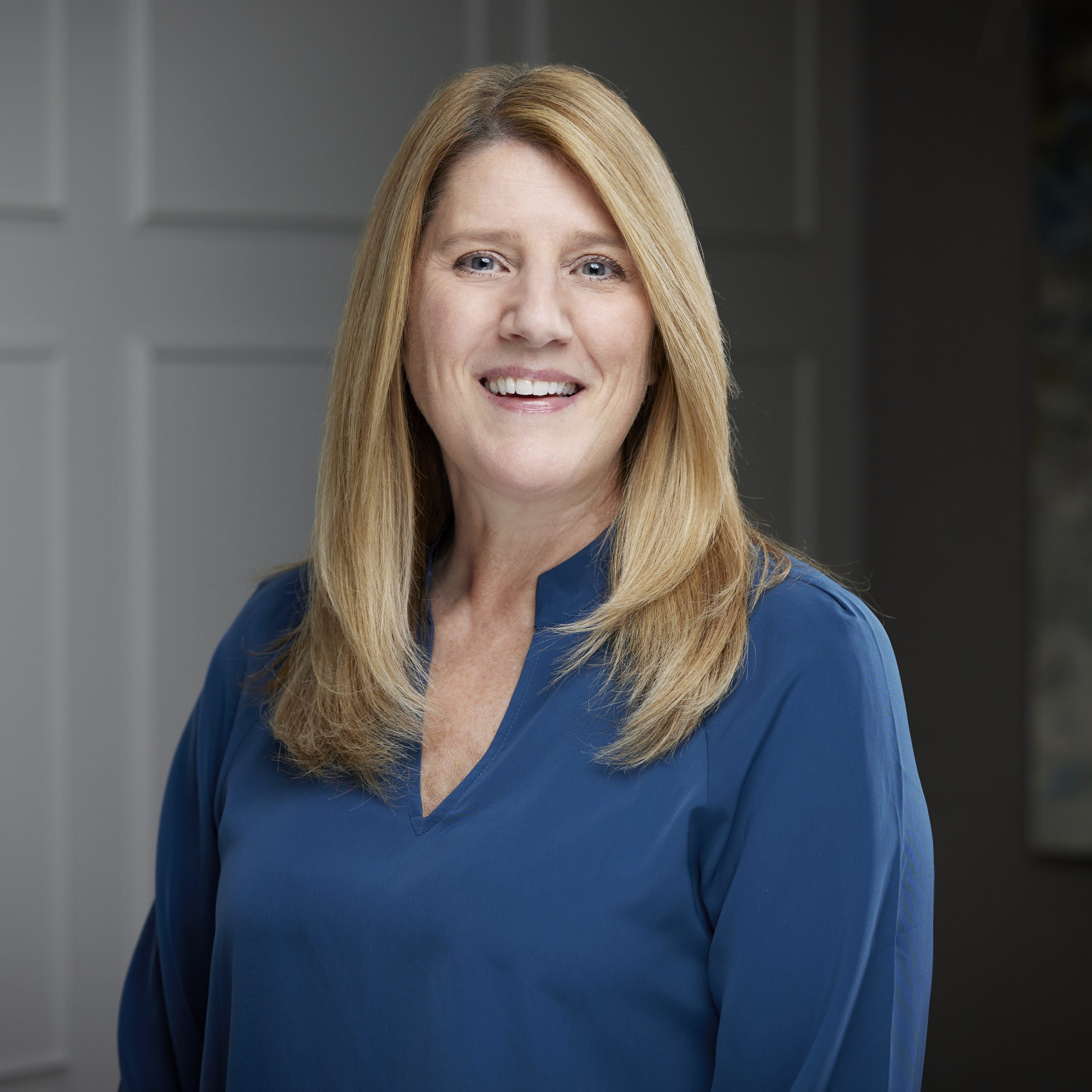 An image of Sharon Bufalino in the St. Catharines office of DDL & Co.