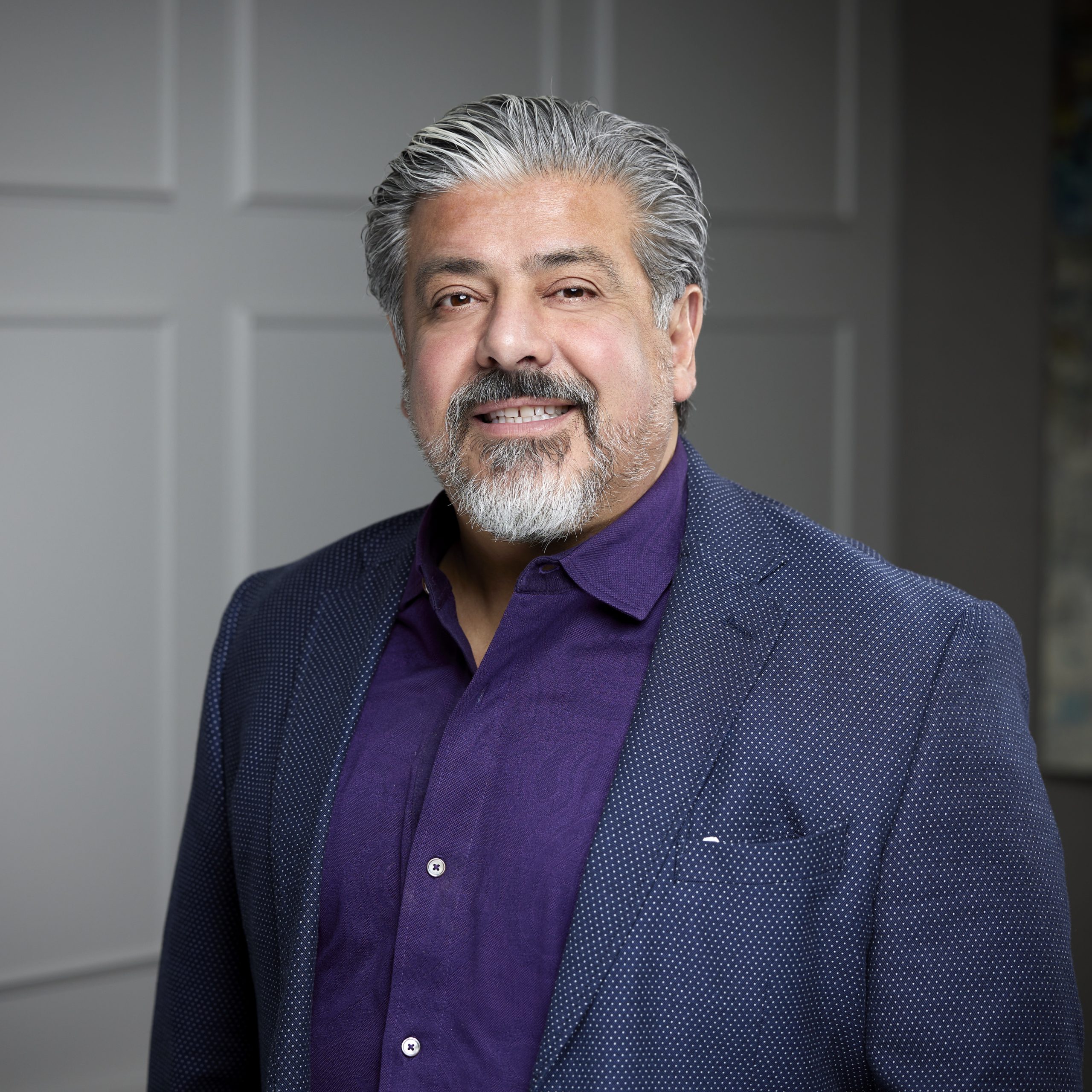An image of Tony DiPaola in the Niagara Region office of DDL & Co.