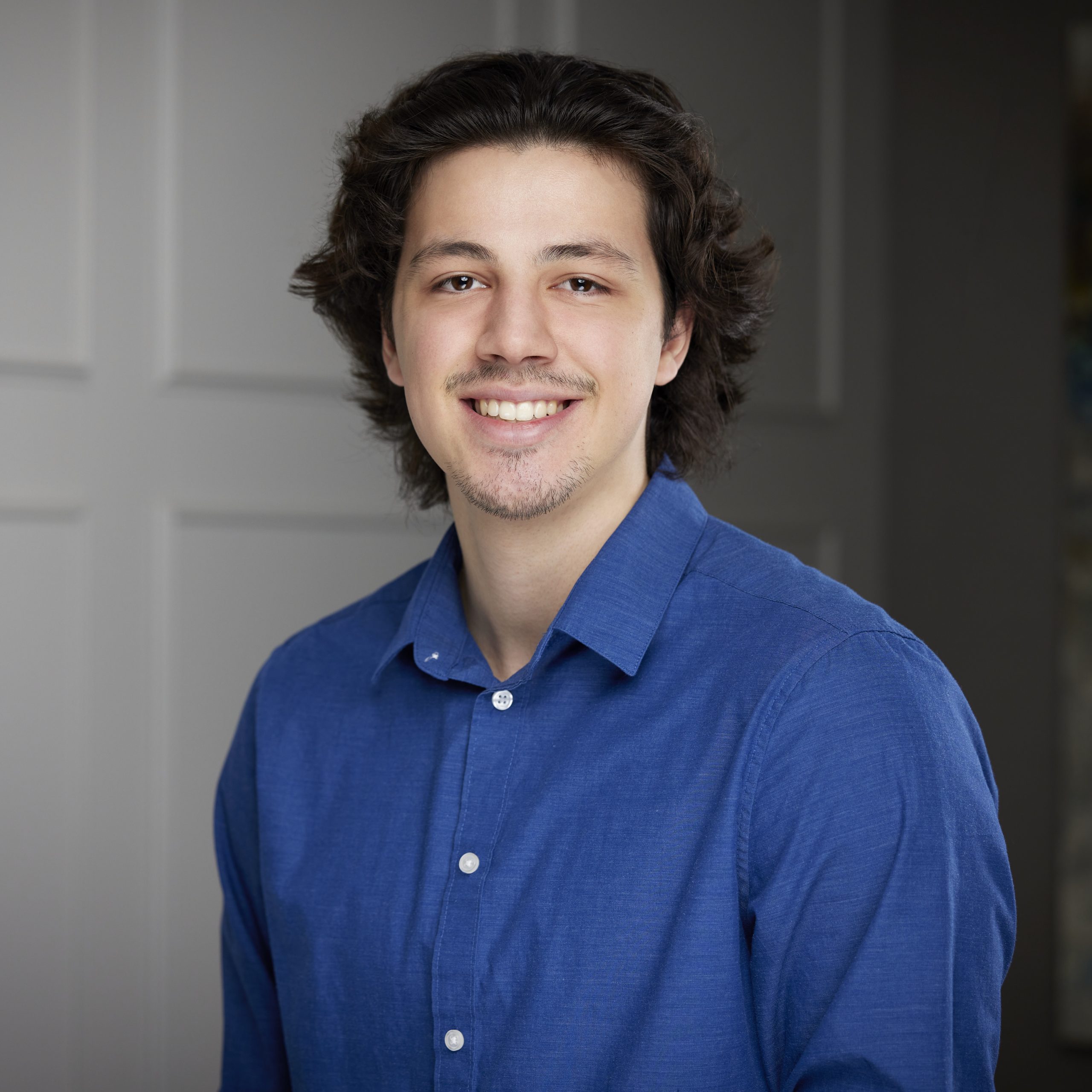 An image of Benny Di Paola in the St. Catharines office of DDL & Co.